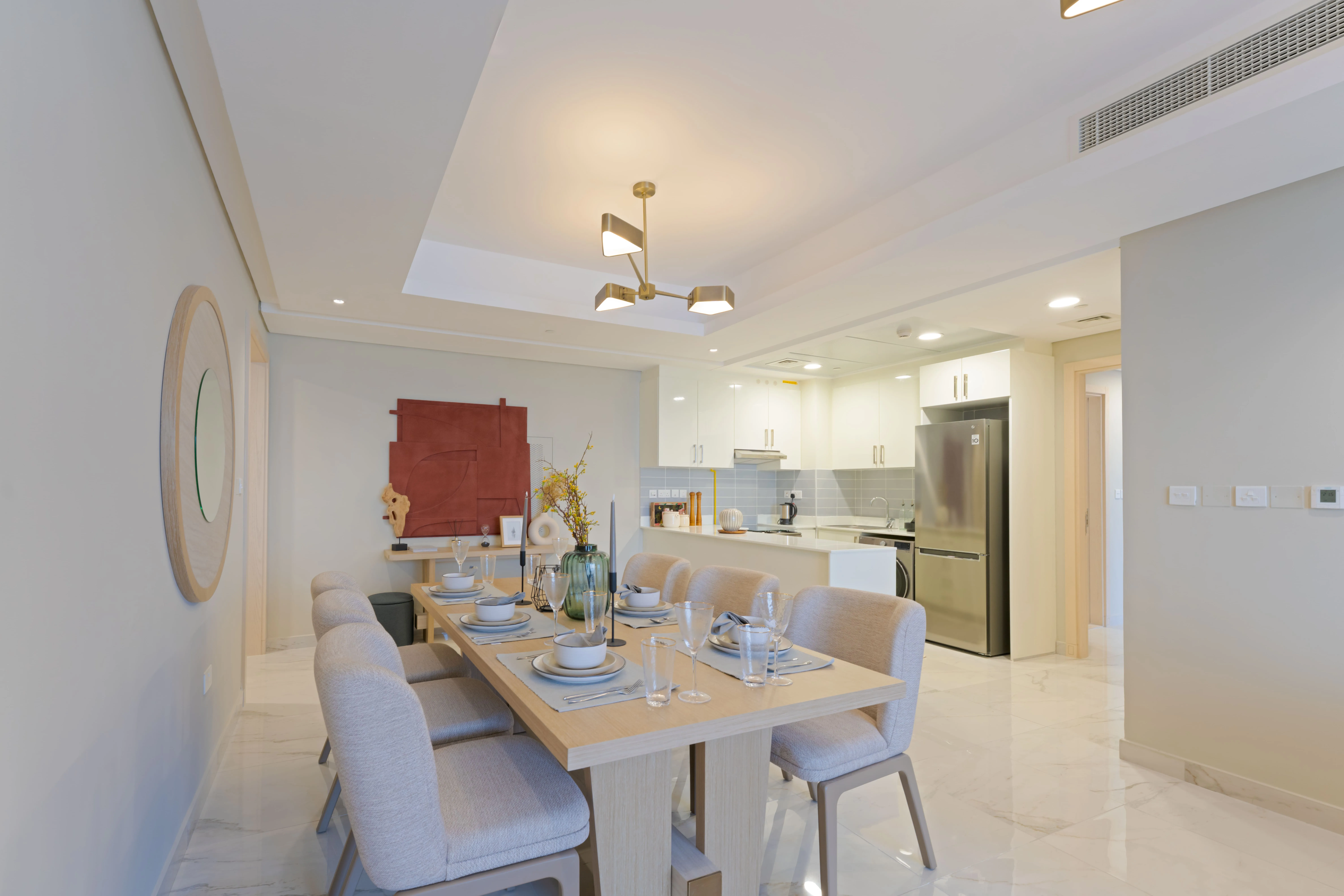 Elegant open-plan dining room inside Leaf Tower apartments on Al Reem Island.