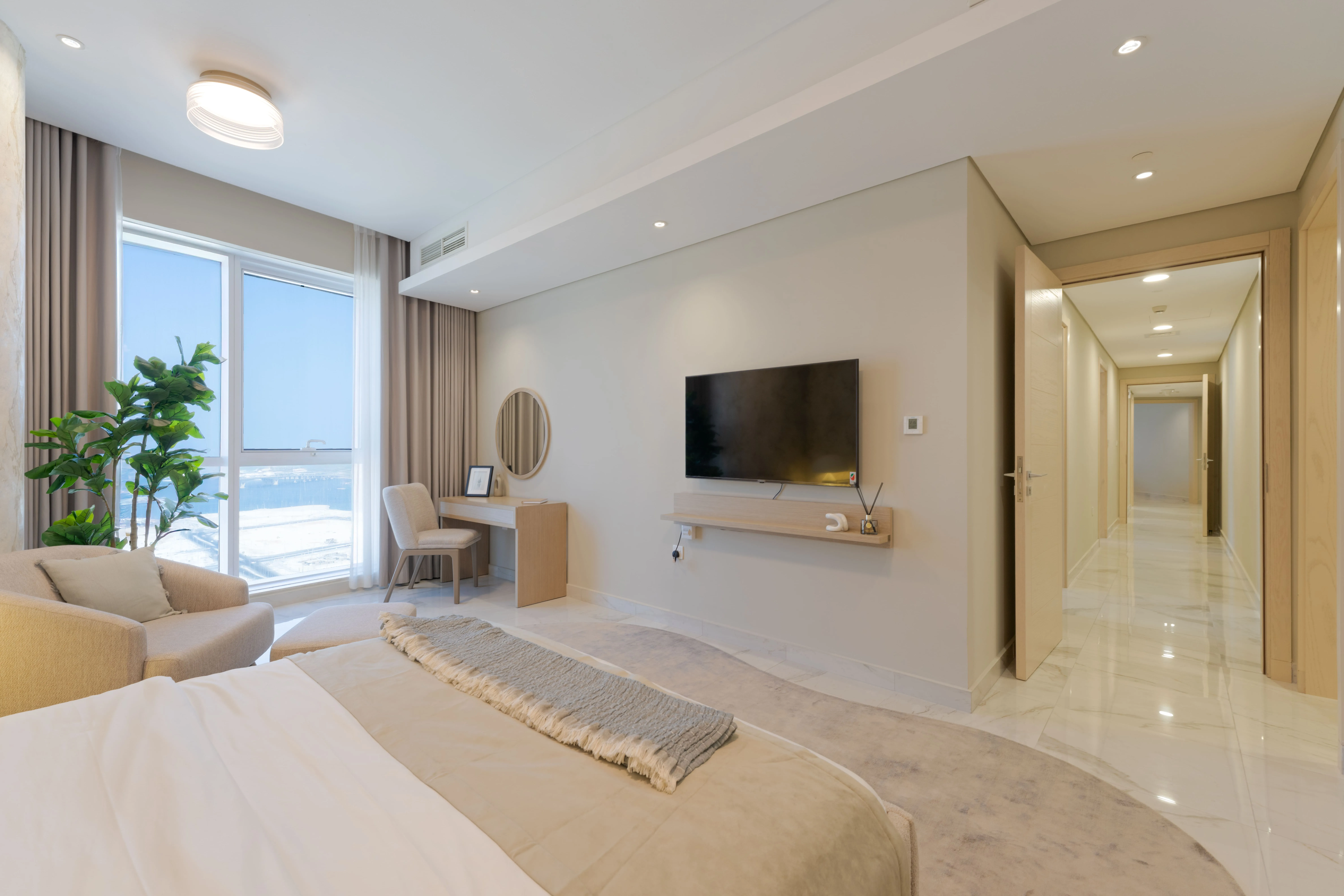 Contemporary master bedroom at Leaf Tower with premium interior finishes.